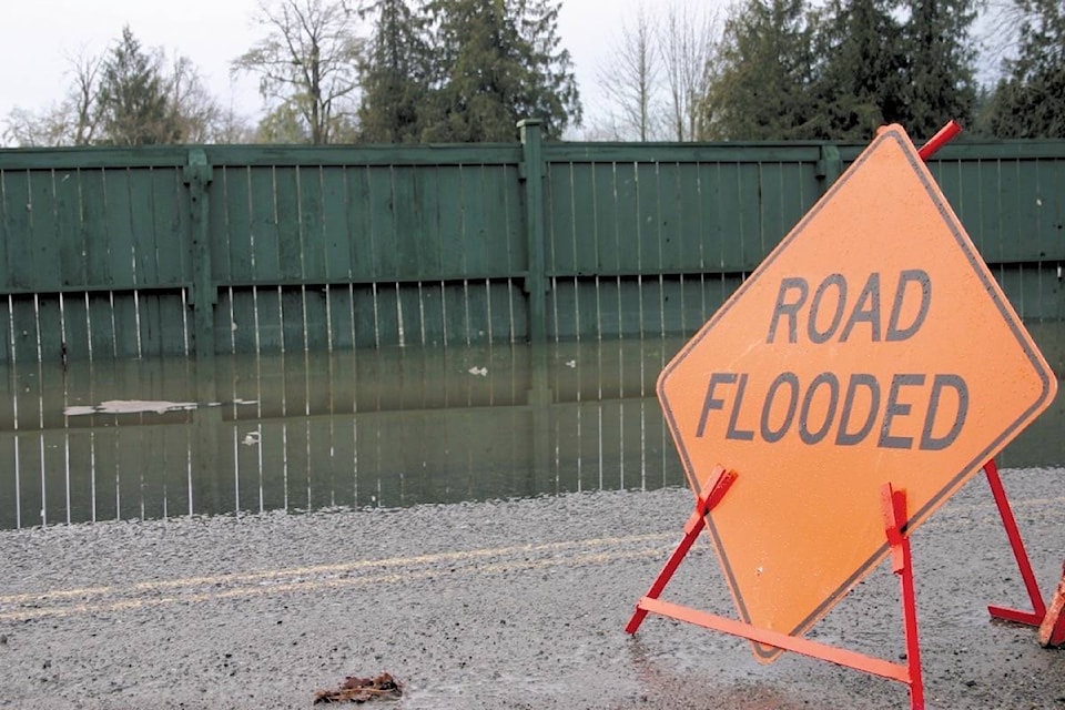 web1_170628-CCI-June30-Suzuki-road-flooded-sign