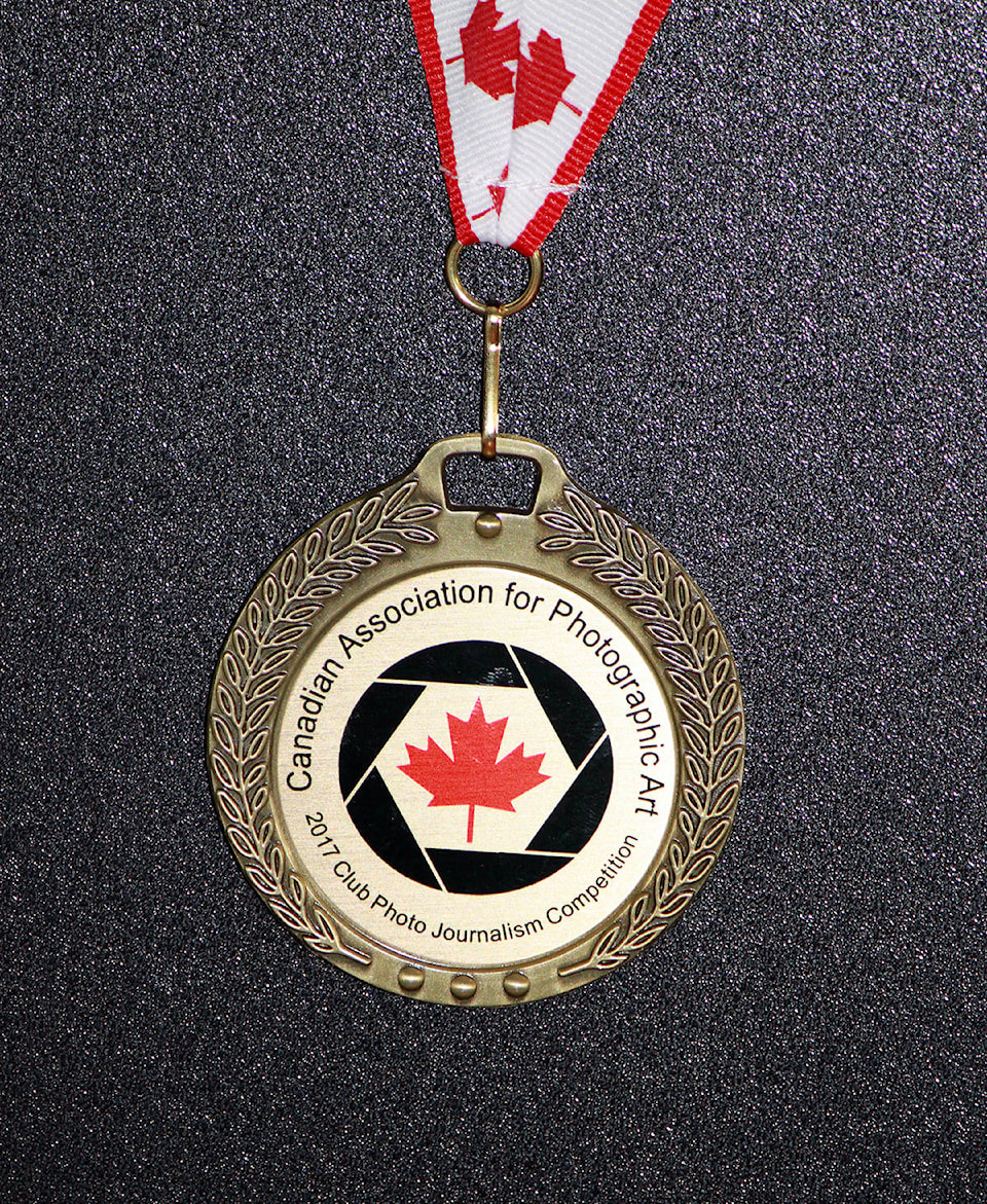 10686528_web1_gold-medal