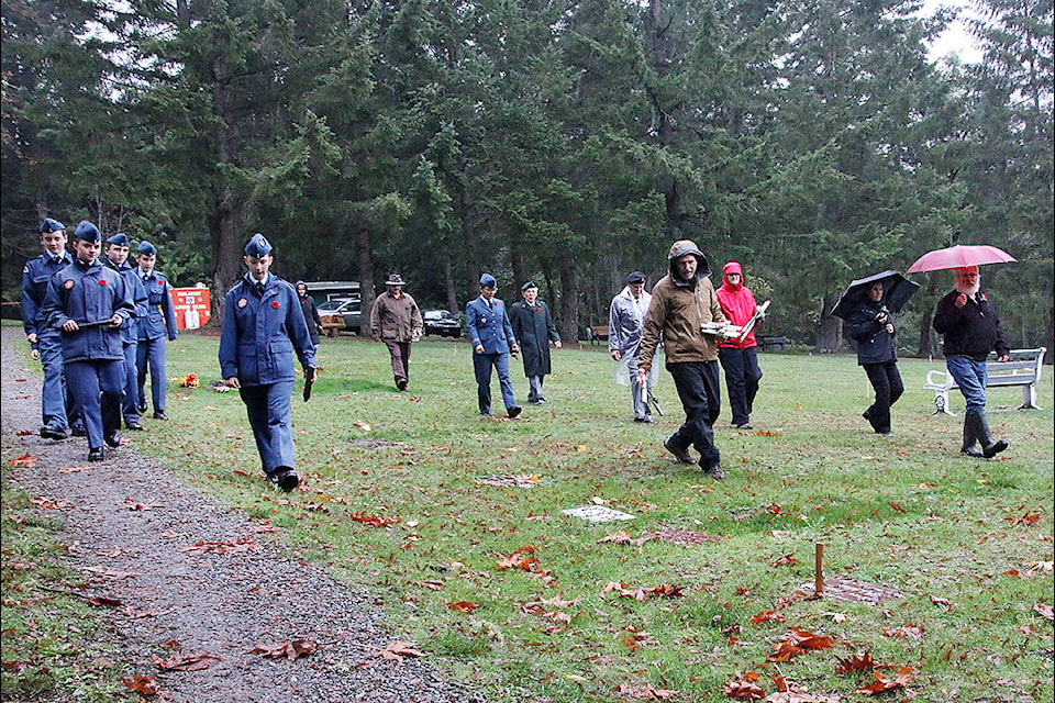 Cowichan 744 Air Cadets, Legion members, and volunteers get ready for an afternoon of placing crosses on veterans graves, beginning with Shawnigan Lake Cemetery. (Lexi Bainas/Citizen)