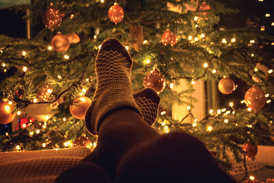 14766701_web1_relaxing-by-Christmas-tree
