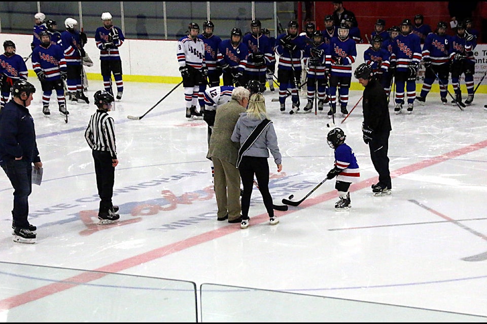 Mayor Rod Peters drops the opening puck at Lake Cowichan Minor Hockey Jamboree Day, Jan. 19. (Lexi Bainas/Gazette)