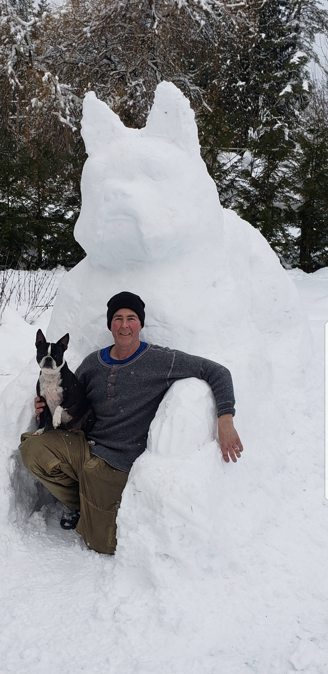 15562929_web1_SNOW-dog-sculpture