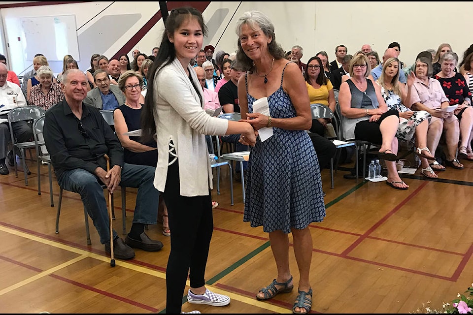Lorene Benoit presents a bursary to Cowichan Secondary student Keisha Sampson. (submitted)