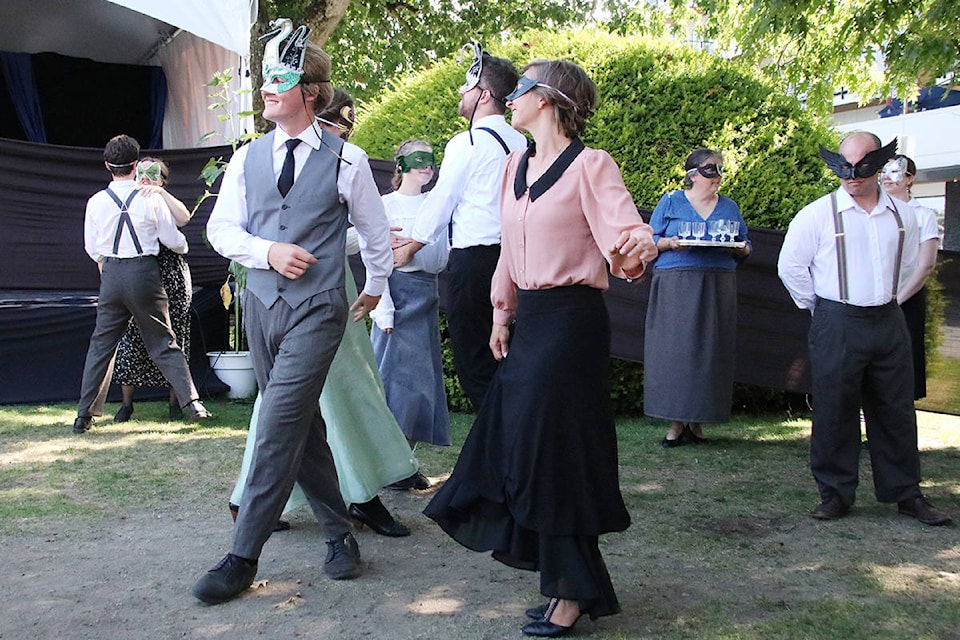 Dancing begins at the big party at Leonato’s house while the villain, Don John, right in black mask, plots to ruin Claudio’s wedding hopes. (Lexi Bainas/Citizen)