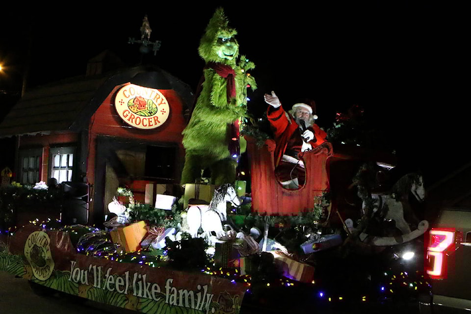 Lake Cowichan’s Christmas parade includes Santa Claus to delight all the families lining the town streets. (Lexi Bainas/Gazette)
