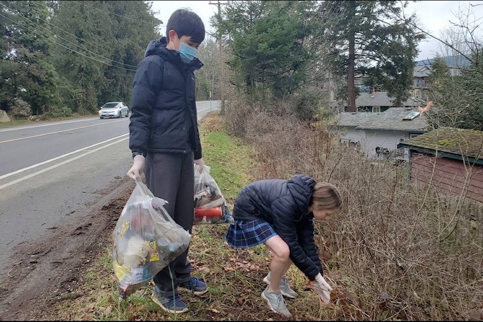 Grade 7 Students at Queen of Angels school walked up and down Maple Bay and Tzouhalem road picking up garbage to celebrate their annual Catholic Schools Week by doing something good for the community. (Submitted)