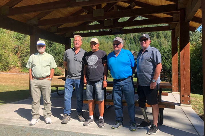 Area I director Klaus Kuhn, developer Greg Adams, and Cowichan Lake Community Forest Cooperative board members Richard Weir, Lorne Scheffer and Ross Forrest stand in the “new” picnic shelter at Mile 77 Park in Youbou, funded by Adams. The Forest Cooperative donated money to help improve the waterfront at the park. (Kevin Rothbauer/Gazette)