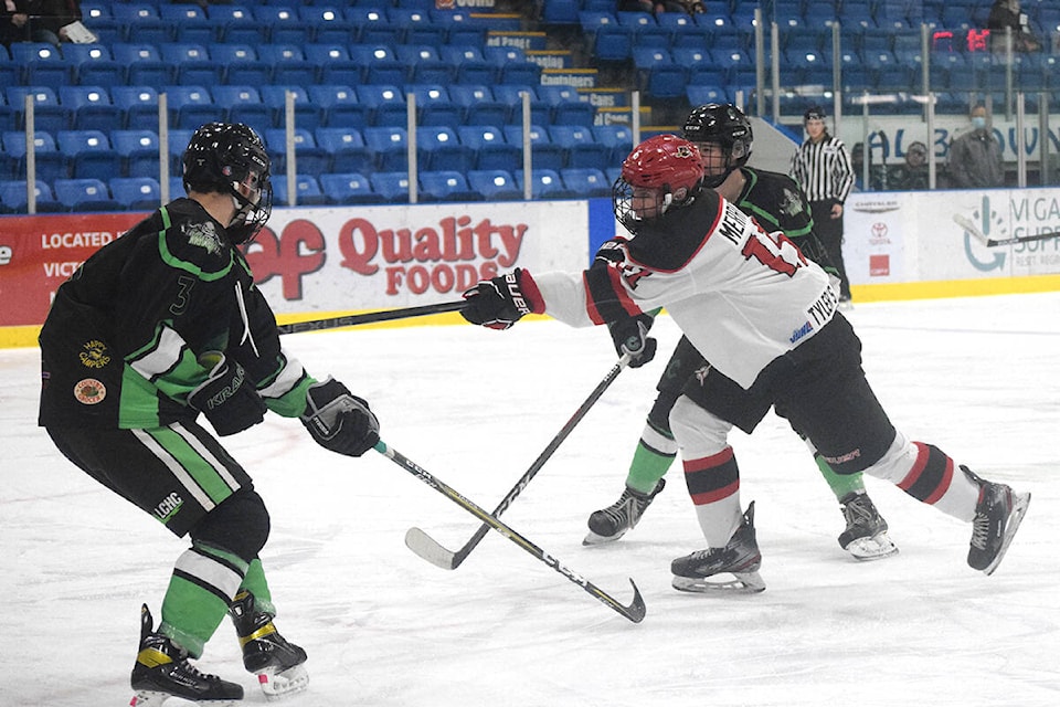 Port Alberni Bombers forward Jaydon Merritt fires a shot at the Kraken goal. (ELENA RARDON / ALBERNI VALLEY NEWS)