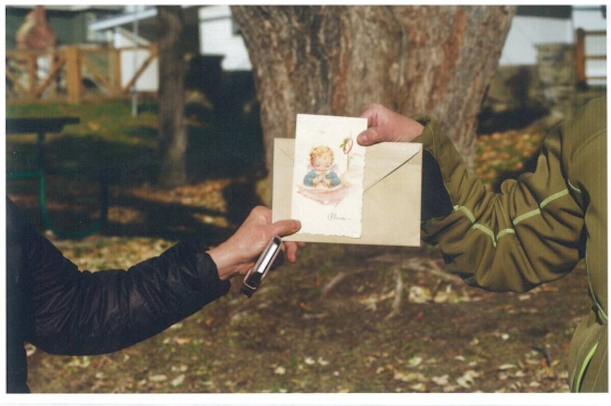 The card itself, which has passed back and forth between Nancy (left) and Catherine( right) since 1964, and since 1960 between their parents. Pictured in Kimberley, B.C. when they exchanged it in 2020. (Image courtesy of Catherine Crewe)