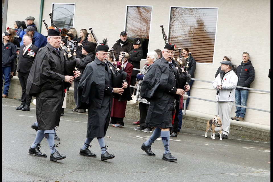 Pipers add a stirring air to the Lake Cowichan parade for Remembrance Day on Nov. 11, 2022. (Lexi Bainas photo)