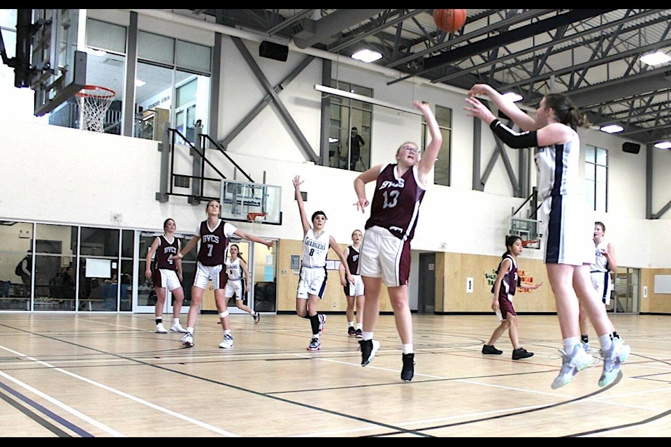 The Duncan Christian School Chargers senior girls basketball team beat Bulkley Valley Christian School by a 61-38 score during opening round provincial 1A tournament action in Nanaimo last week. (Courtesy of Tom Veenstra)