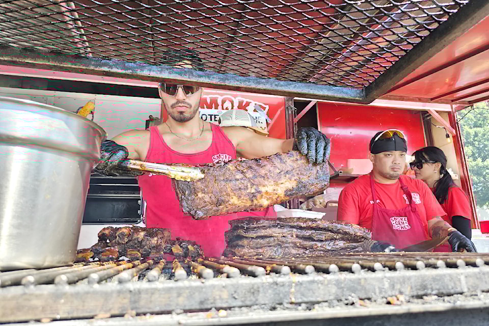 The grill at Smoke Dem Bones was working hard to keep up with demand on day 2 of RibFest 2024 on Saturday, Aug. 17, which had  started by shattering attendance records for day 1, when 14,000 attended on Friday, beating the previous record of 11,000.
