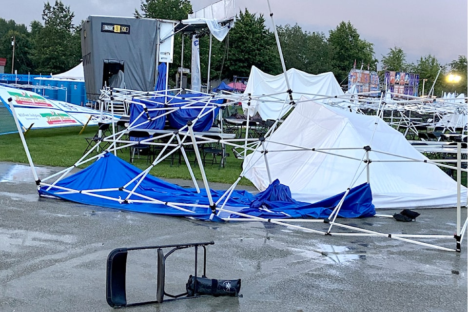 An overnight wind storm knocked down most of the shade protection at the 91ԭ RibFest on Sunday, Aug. 18. Volunteers cleaned it up in time to accommodate another 10,000 visitors, bringing the 3-day total to a record 47,00.