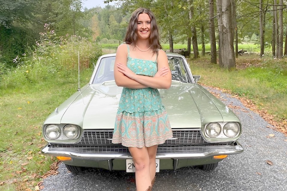 Alanna Madec, 18, and Theodore, her classic Thunderbird.