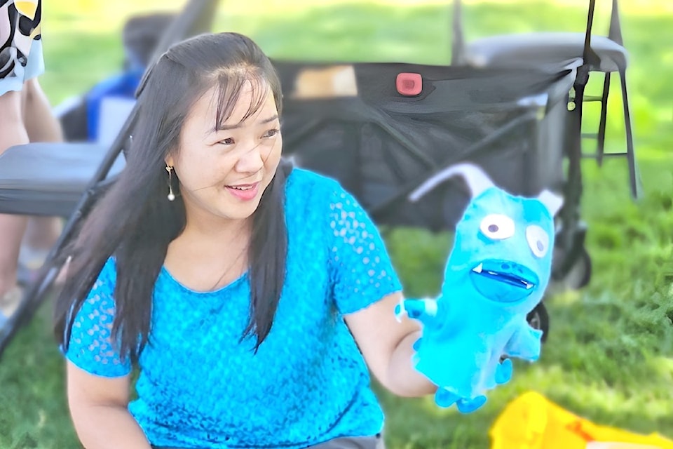 Kieu Trieu from the Fraser Valley Regional Library in 91ԭ introduced a cute monster to kids in Douglas Park during the second 91ԭ Arts Council Outdoor Arts Fair held Saturday, Aug. 3 and Sunday, Aug. 4.