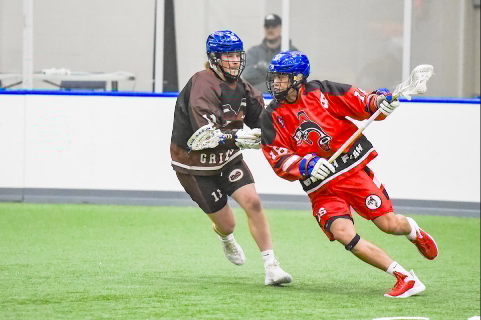 Shooting Eagles' Nick Musso is double-teamed by Sea Spray's Aidan Ellis and Levi Touhey during Arena Lacrosse League West Division action at  Events Centre on Nov. 30. 