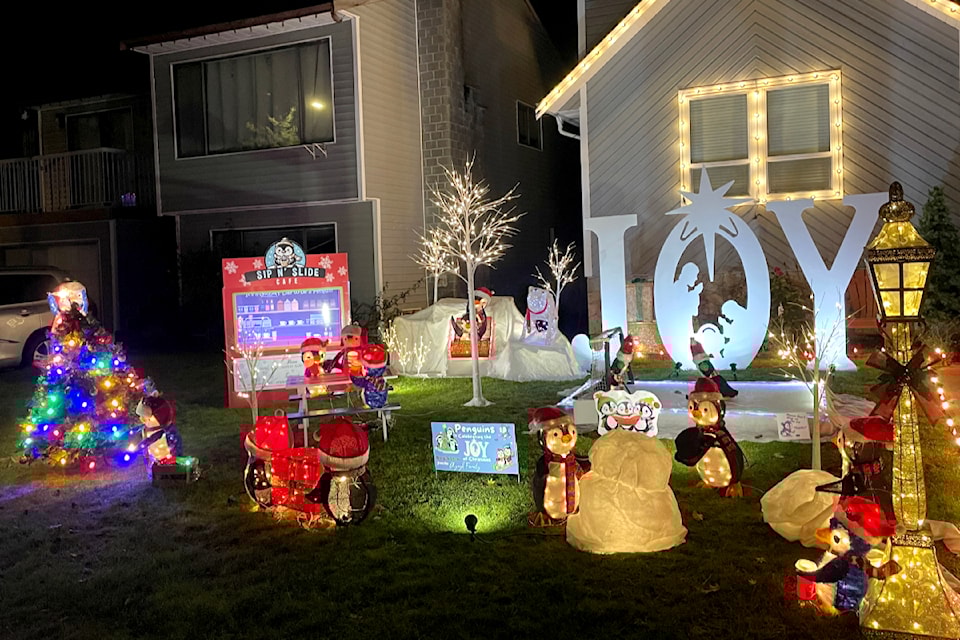 Penguin-themed display is at 6474 197 St. 