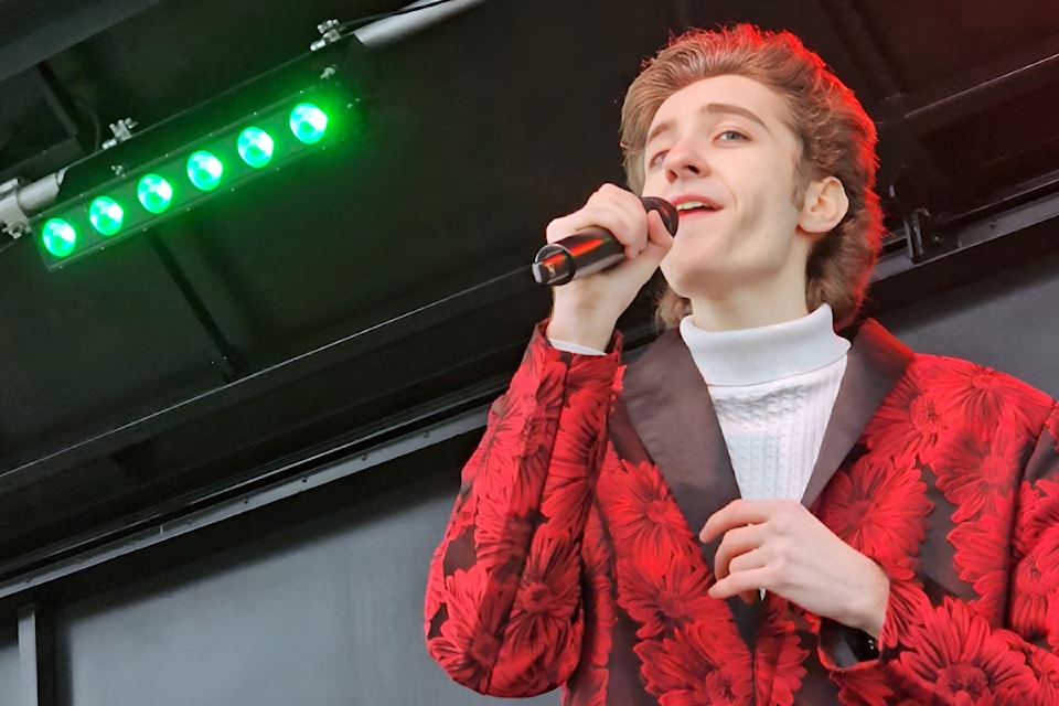 Singer Danny Baylen opened the Magic of Christmas event in 91ԭ City by crooning classic holiday songs.