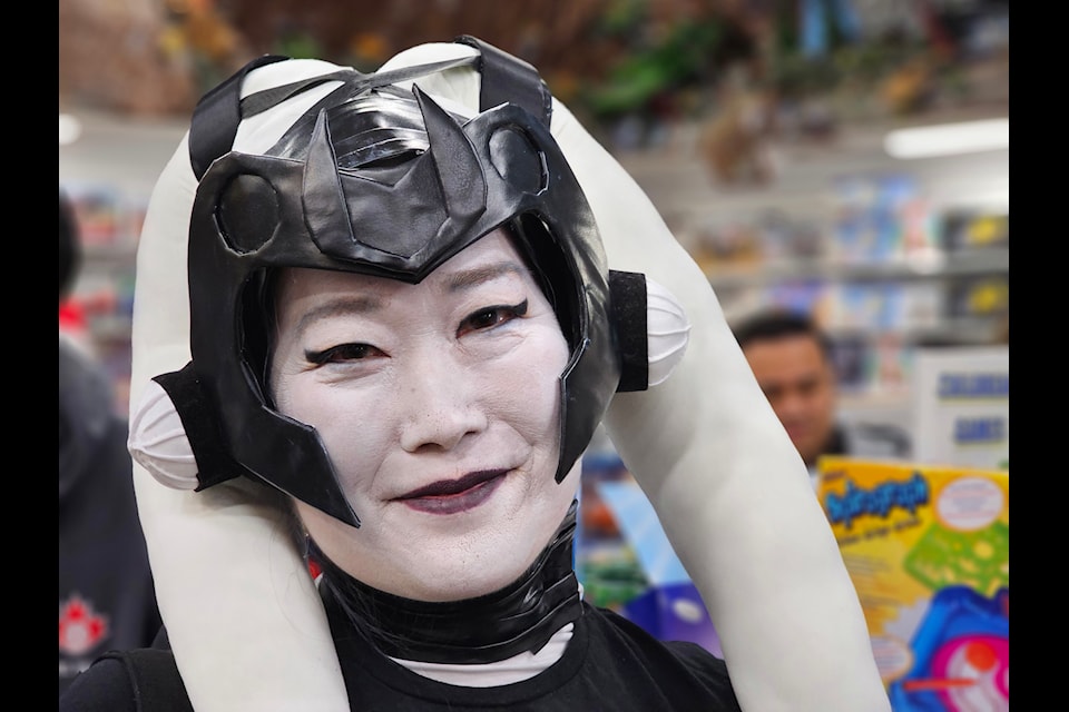 Stars Wars fans lined up Langley's Toy Traders for the annual Santa Vader photo opportunity on Sunday, Dec. 8, the eighth year of the annual charitable fundraiser.