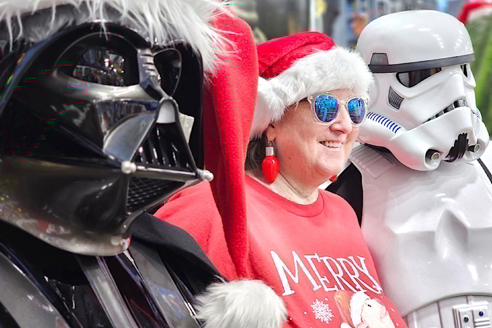 On Sunday, Dec. 8, the annual 'Santa Vader' fundraiser at 91ԭ's Toy Traders store raised a near-record $4,100 for charity. People lined up, many in fill; Star War regalia  for an opportunity for a by-donation photo.