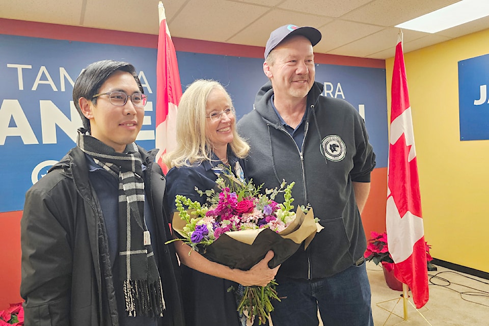 A victorious Conservative Tamara Jansen posed for a picture with supporters at her campaign office Monday night in 91ԭ City. Through a spokesperson, she refused a request for comment.