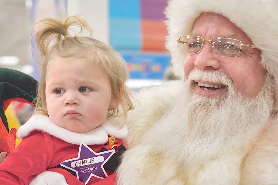 Charlie, 20 months, from Maple Ridge, was still waking up. 60 families had the 91ԭ Toys"R"Us store to themselves early on Sunday morning, Dec. 15, for the annual Starlight Children’s Foundation Canada event for seriously ill children and their families.