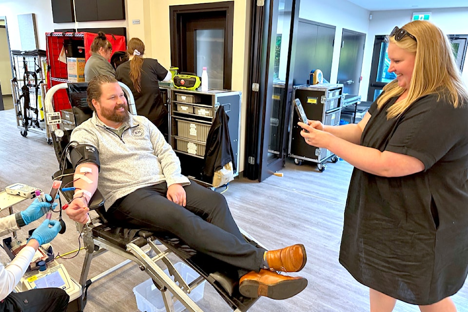 Marnie Venema captured a photo of her husband, Nik, as he donated blood for the 100th time on Tuesday, July 2, 2024. 
