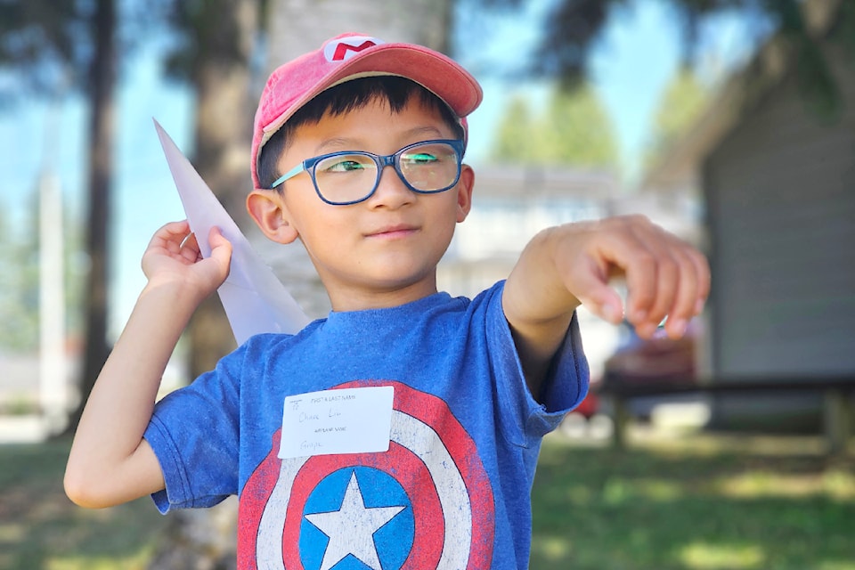 Chase, 6, from Surrey, was among more than 35 children and parents who took part in the fourth annual Explore Science Club paper airplane competition held in Buckley Park on Saturday, July 6.