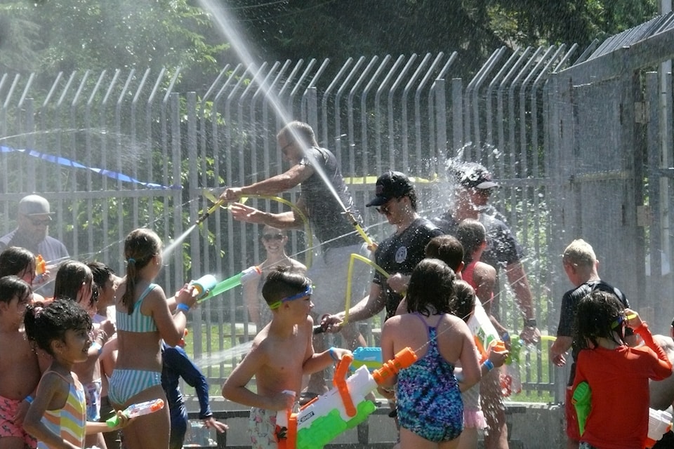 91ԭ City fire fighters took on a crowd of kids at Al Anderson Pool in the annual Legendary Water Fight on Saturday