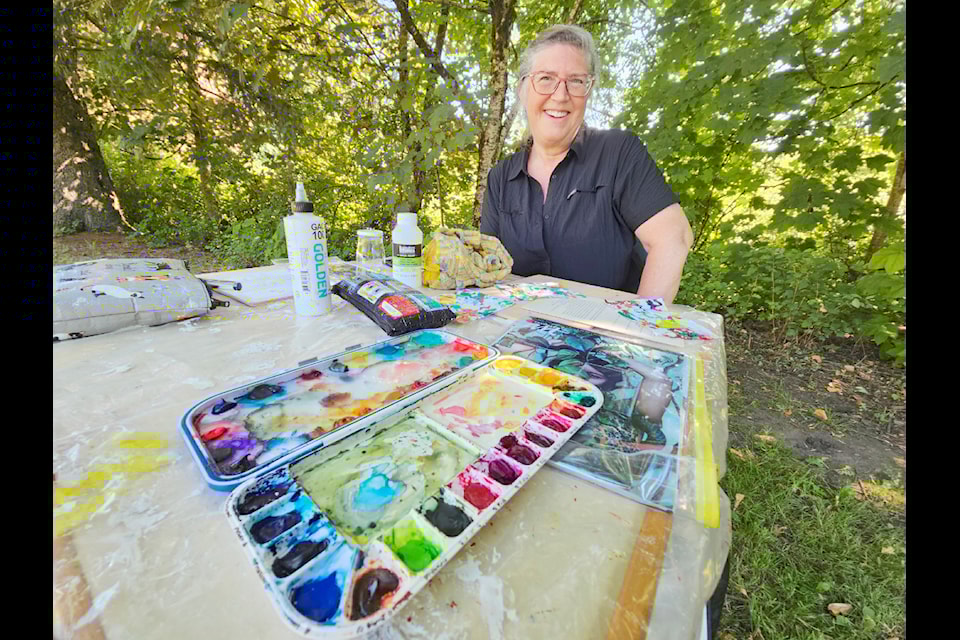 Otter resident Sandra Meier, a mixed-media artist, was one of nine who took part in the 91ԭ Arts Council's Art in the Park plein-air event held on Saturday, July 6 at 91ԭ City's Portage Park.