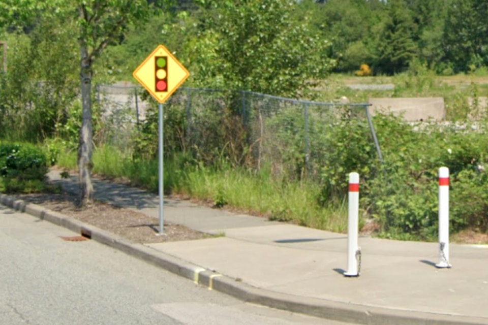 The upside-down traffic sign, before it was corrected