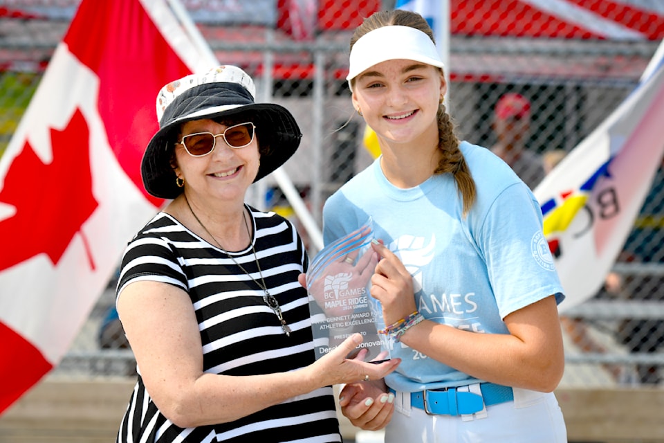 Pam Alexis, minister of Agriculture and Food and MLA for Abbotsford-Mission, presented the W.R. Bennett Award to  ball player Deschanel Donovan. 