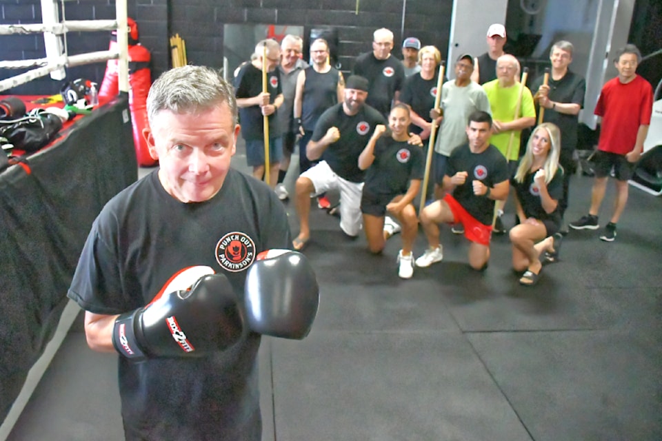 About two dozen people gather several times each week in Langley for Punch Out Parkinson's. 