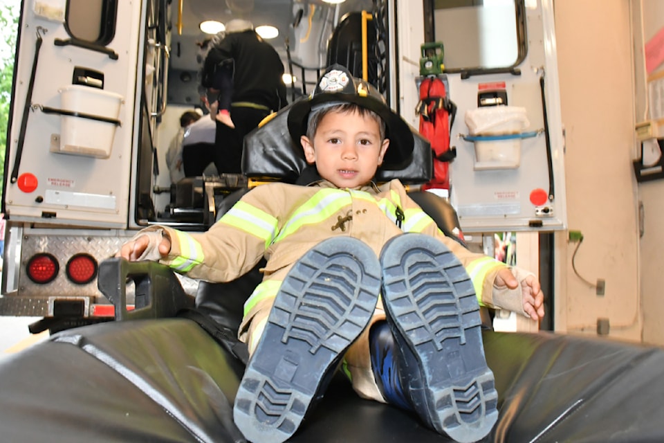 In his own little firefighter outfit, Mateo Verhoef checked out the BC Ambulance that was at the Murrayville fire station on June 11, 2024 for the annual open house. 