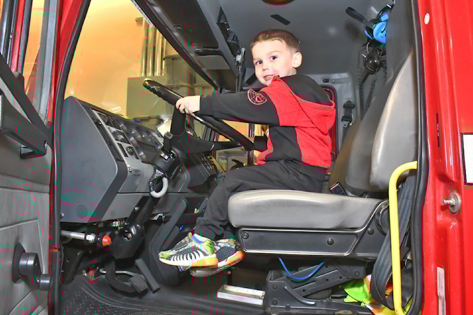 The Township fire hall open housesin 2024 were an opportunity for kids such as Luke Karman to check out the view from the driver's seat of a massive fire truck. 