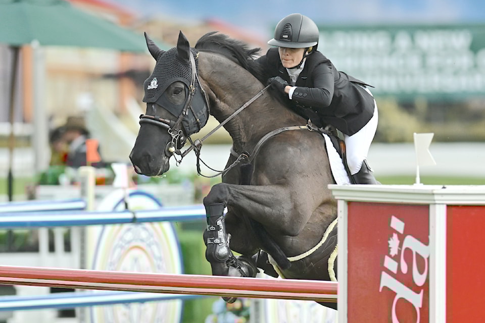 Tiffany Foster riding Battlecry during the RBC Grand Prix of Canada at the Spruce Meadows National in Calgary on  Jun, 15, 2024 . 