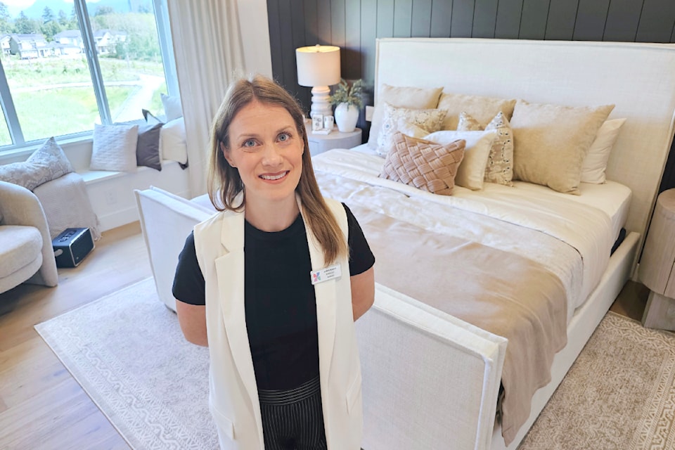 Aubrie Ederer, PNE Manager of gaming, showed off the master bedroom of this year's prize home on Monday, June 24. It is the third PNE prize home built in 91ԭ in as many years.