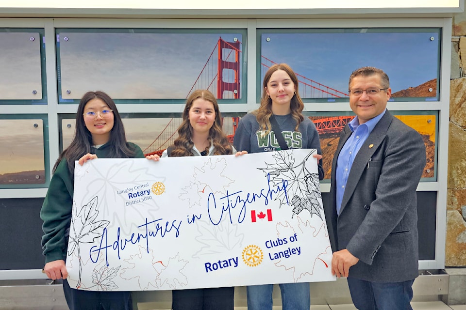 Amint Kim, Emma Cazacu, and Danica Bateman were send off on their adventure by Rotarian Lilian Cazacu. 