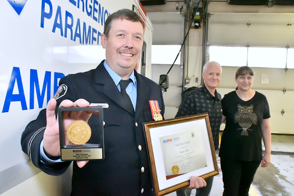 Brian Ulle (left) has been neighbours with Joey and Collen Vance for more than 15 years, and in 2023, administered life-saving CPR on Joey. BCEHS presented him with the Vital Link award recently. 