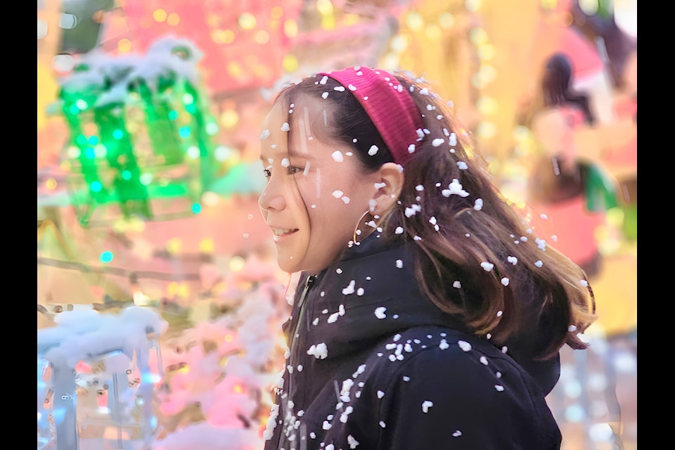 Crista, 12, from Murrayville, was enjoying the machine-made snow. Newlands was packed for the Tuesday morning Christmas Wish breakfast for the 91ԭ Christmas Bureau.