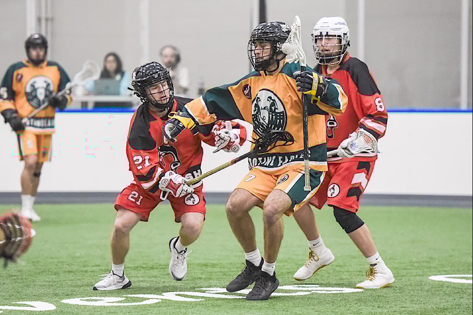 The Shooting Eagles' Keegan Kozack fends off the check from Black Fish's Cameron Ickert during Arena Lacrosse League West Division action at 91ԭ Events Centre on Nov. 24. Kozack had 10 points as his team posted a dominant 30-13 win. 