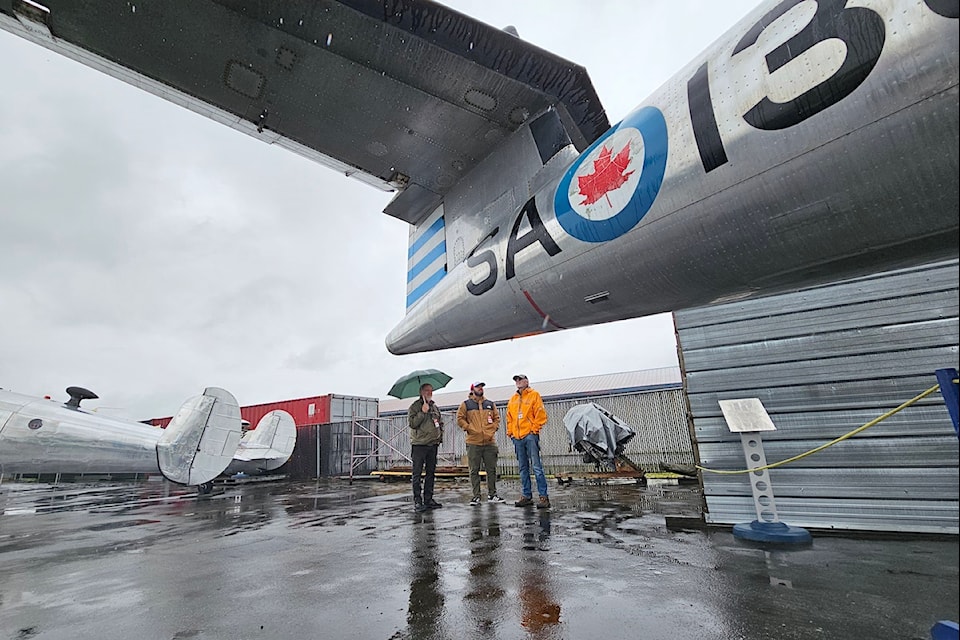  Visitors to the Langley Museum of Flight brought umbrellas during a special 2024 Father's Day event. After an unsuccessful attempt to find a new location at the Langley airport, the museum will be moving to Pitt Meadows.
