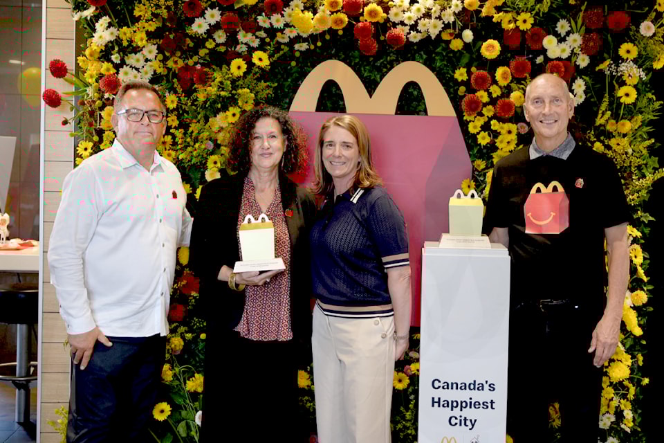 91ԭ McDonald's franchisee Rob Renaud (left to right), City Councillor Rosemary Wallace, Sophie Lussier, human resource director of 91ԭ McDonald's; and Ronald McDonald House Charities BC & Yukon CEO Richard Pass, celebrated 91ԭ's recognition as the Happiest City in Canada.