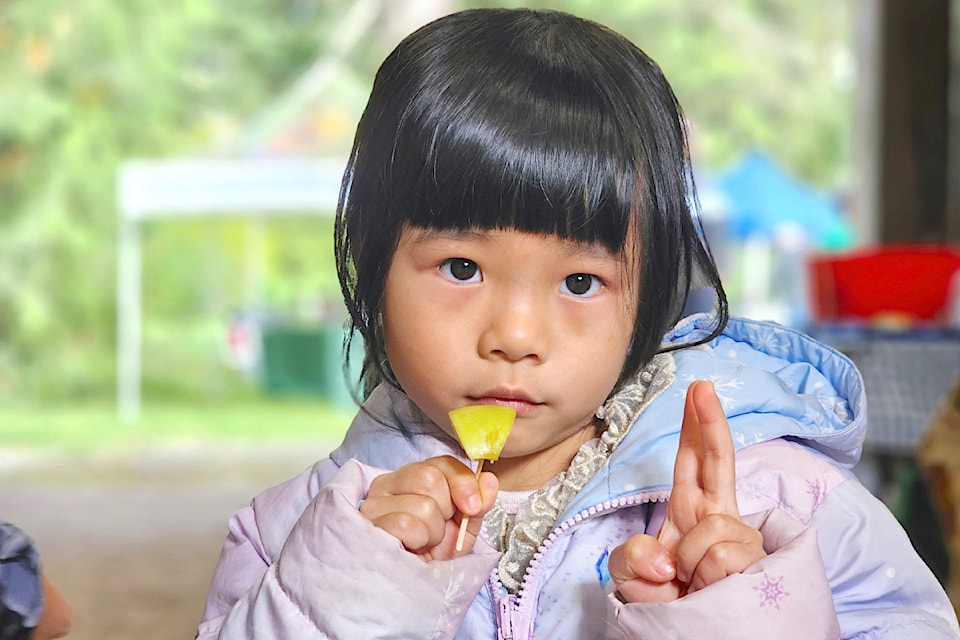 Mia, 5, from WIlloughby, sampled a slice of heritage apple at Derby Reach Park Day on Saturday, Oct.5.