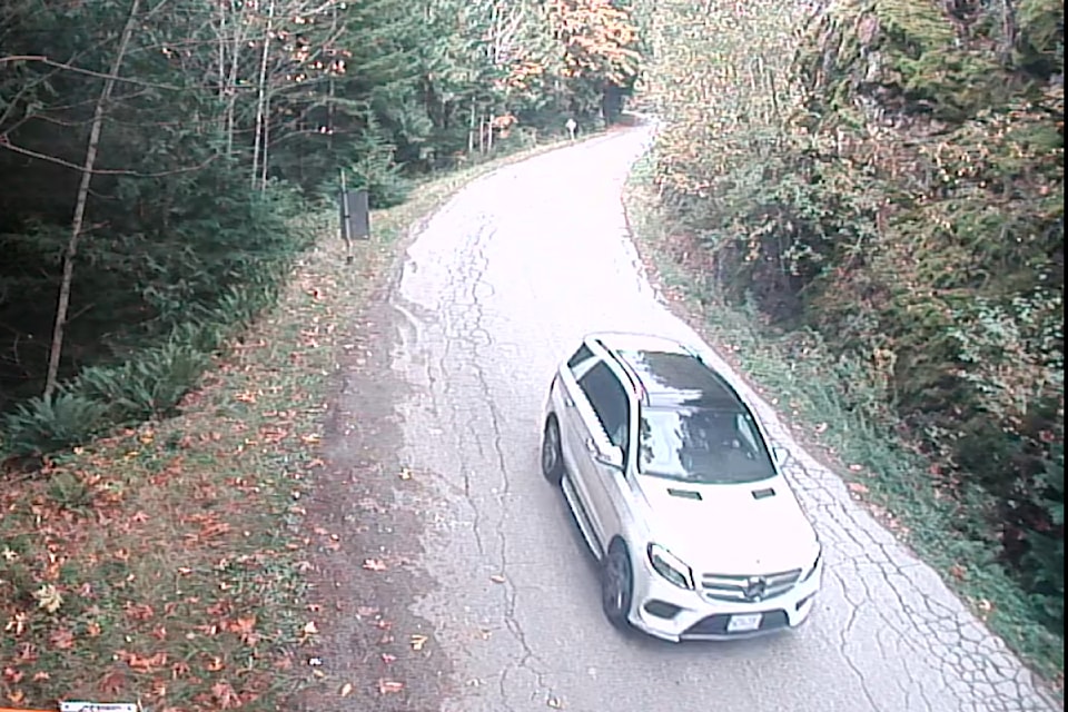 Langley RCMP want to speak to the driver of this white SUV, who may have seen a missing Langley woman.