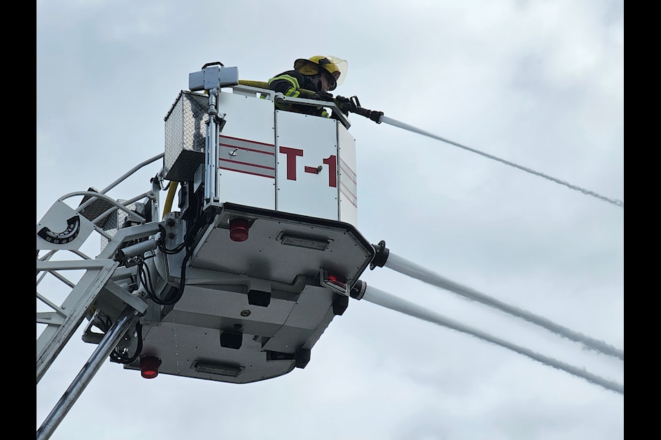 Crews remained at the scene of a major 91ԭ City fire Saturday afternoon.