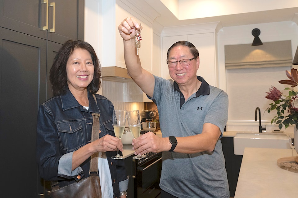 Ken Wong, with Lynn Wong, visited his new house, won in the PNE Prize Home draw on Monday, Sept. 9.