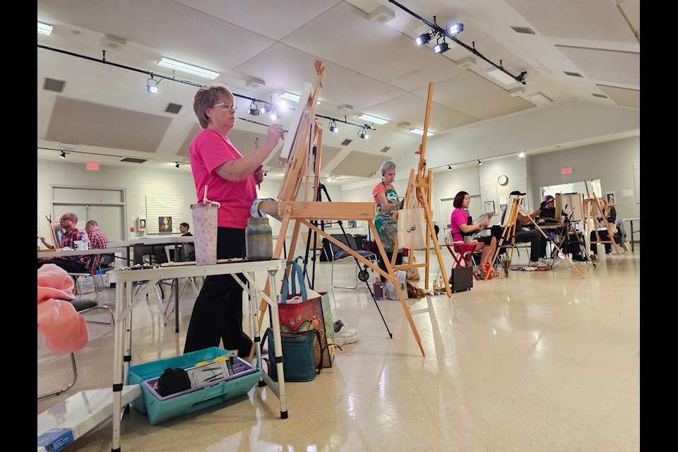 Nine artists were creating images of three models at the 91ԭ Arts Council portrait competition at the Aldergrove Kinsmen Community Centre in September.
