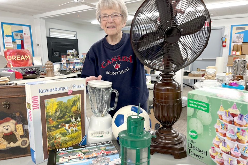 Lawn bowling club member Penny Wellar has spent weeks getting things ready for this Saturday's garage sale at the clubhouse on 54 Avenue.