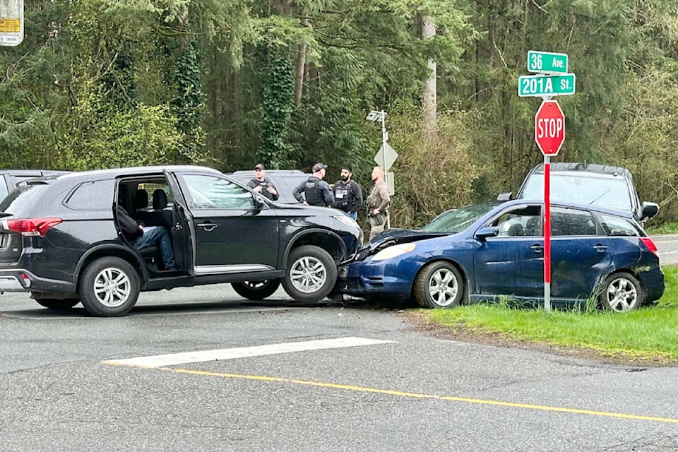 Many police were on scene after a crash involving multiple vehicles spread over two sites near 201A Street and 36 Avenue on April 10, 2025.